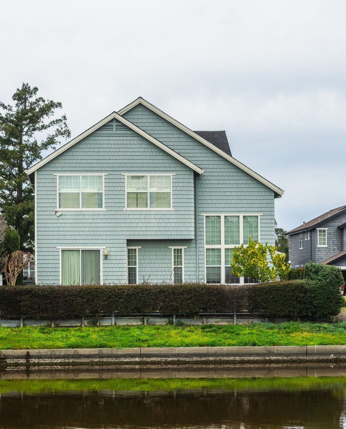A contemporary family house with a front lawn